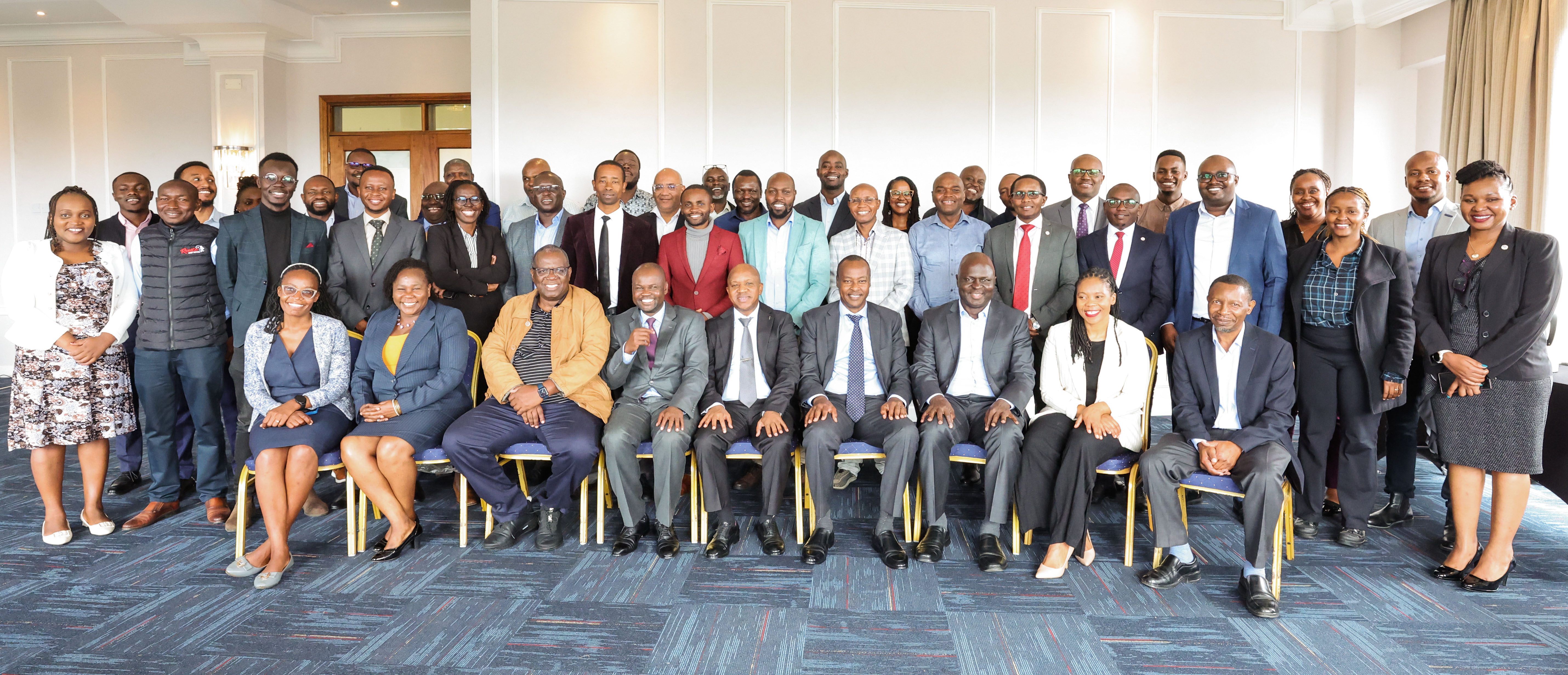 CA's Eng. Leo Boruett, Director, Multimedia Services (fourth right) and other stakeholders pose for a group photo during an engagement forum on the Phase IV of the mobile network connectivity project .