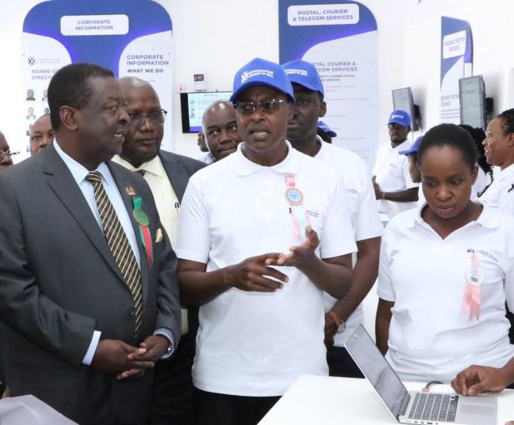Prime Cabinet Secretary Musalia Mudavadi  (second left) at the CA exhibition stand during the Kisumu Regional Show which ended on Sunday.