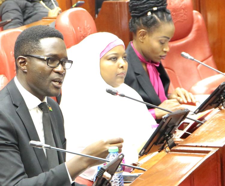 CA Director General Mr. Ezra Chiloba (left) when he appeared before the National Assembly ad hoc committee on the Worldcoin.