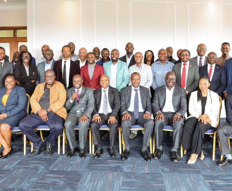 CA's Eng. Leo Boruett, Director, Multimedia Services (fourth right) and other stakeholders pose for a group photo during an engagement forum on the Phase IV of the mobile network connectivity project .